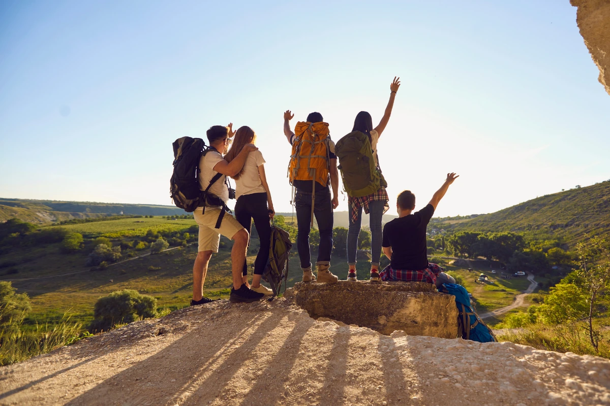 Group of friends at the summit of a mountain